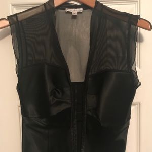 Top goes well with jeans or dress up evening.